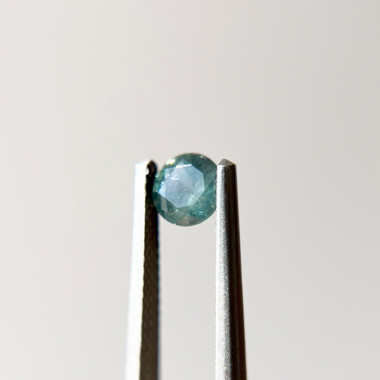 Round Opalescent Teal Blue Montana Sapphire