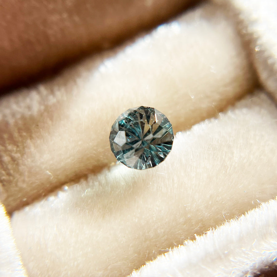 Parti Color Teal Sapphire StarBrite™ Cut by John Dyer