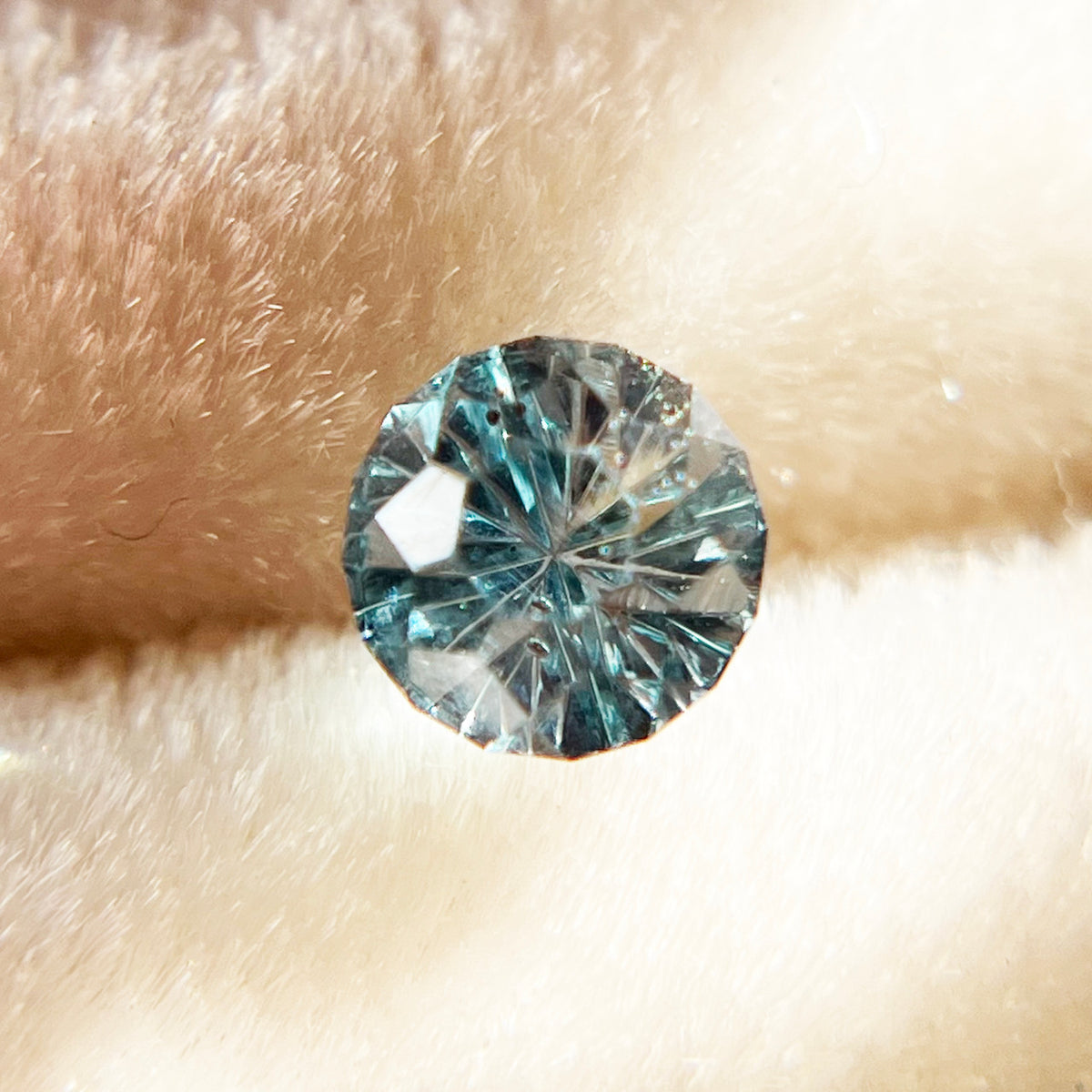 Parti Color Teal Sapphire StarBrite™ Cut by John Dyer