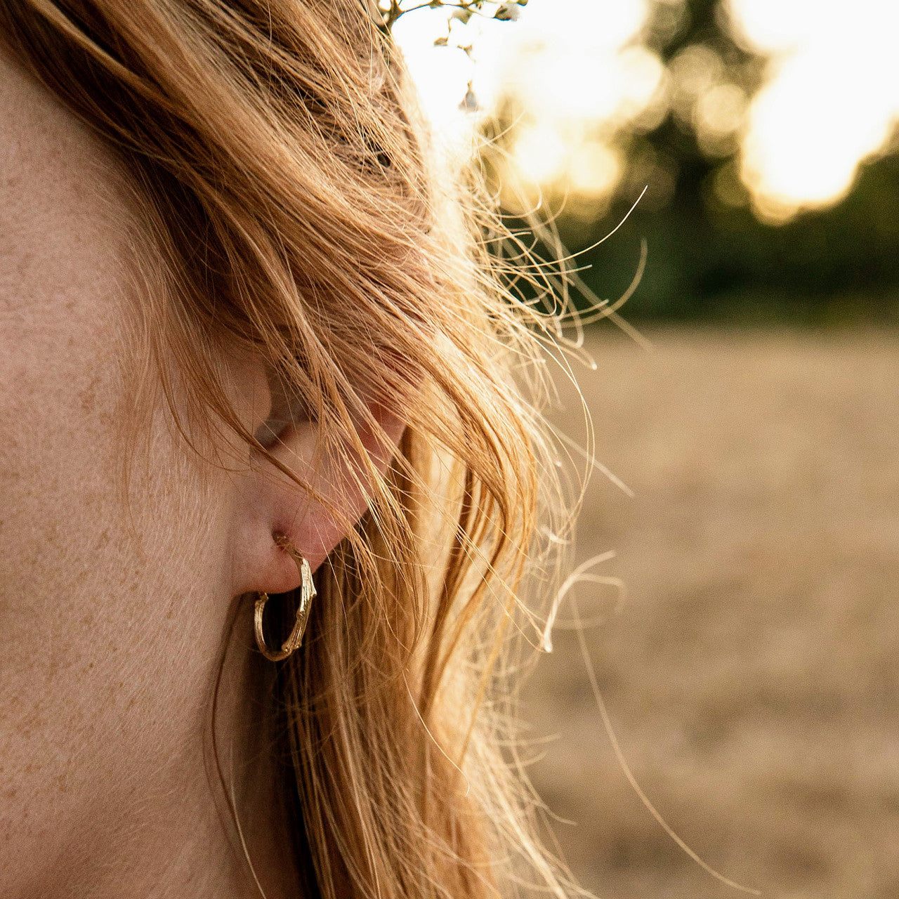 Nature inspired tree branch hoops by Olivia Ewing Jewelry