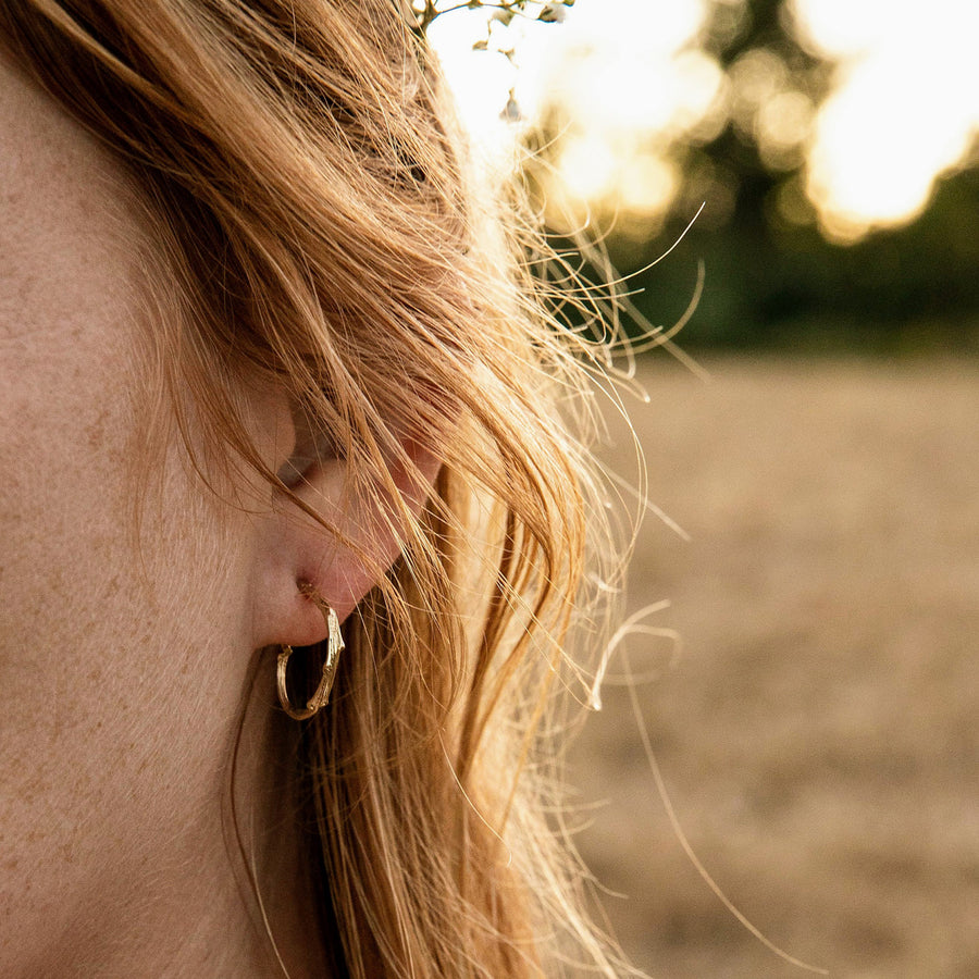 Nature inspired tree branch hoops by Olivia Ewing Jewelry