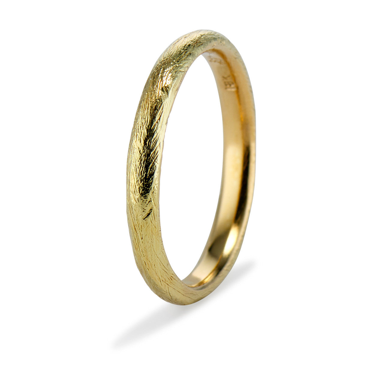 Textured gold wedding band by Olivia Ewing Jewelry