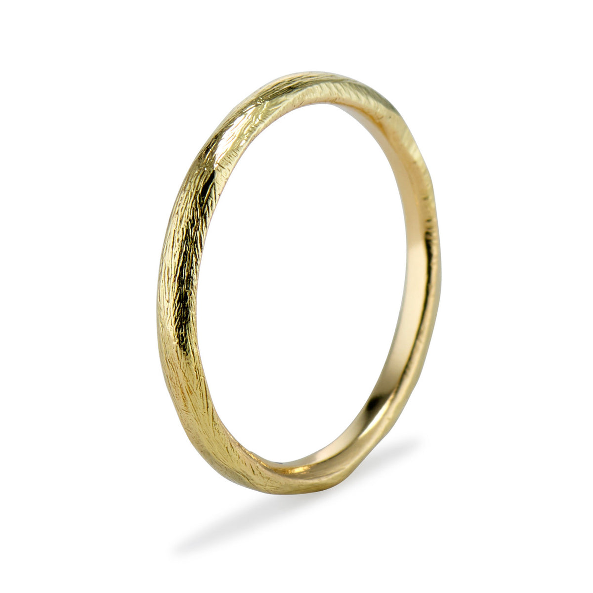 Handmade textured wedding band by Olivia Ewing Jewelry