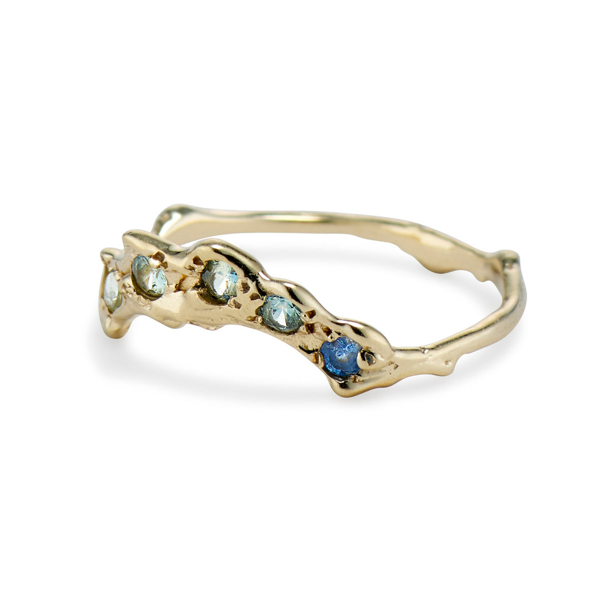 Curved wedding band with montana sapphires by Olivia Ewing Jewelry