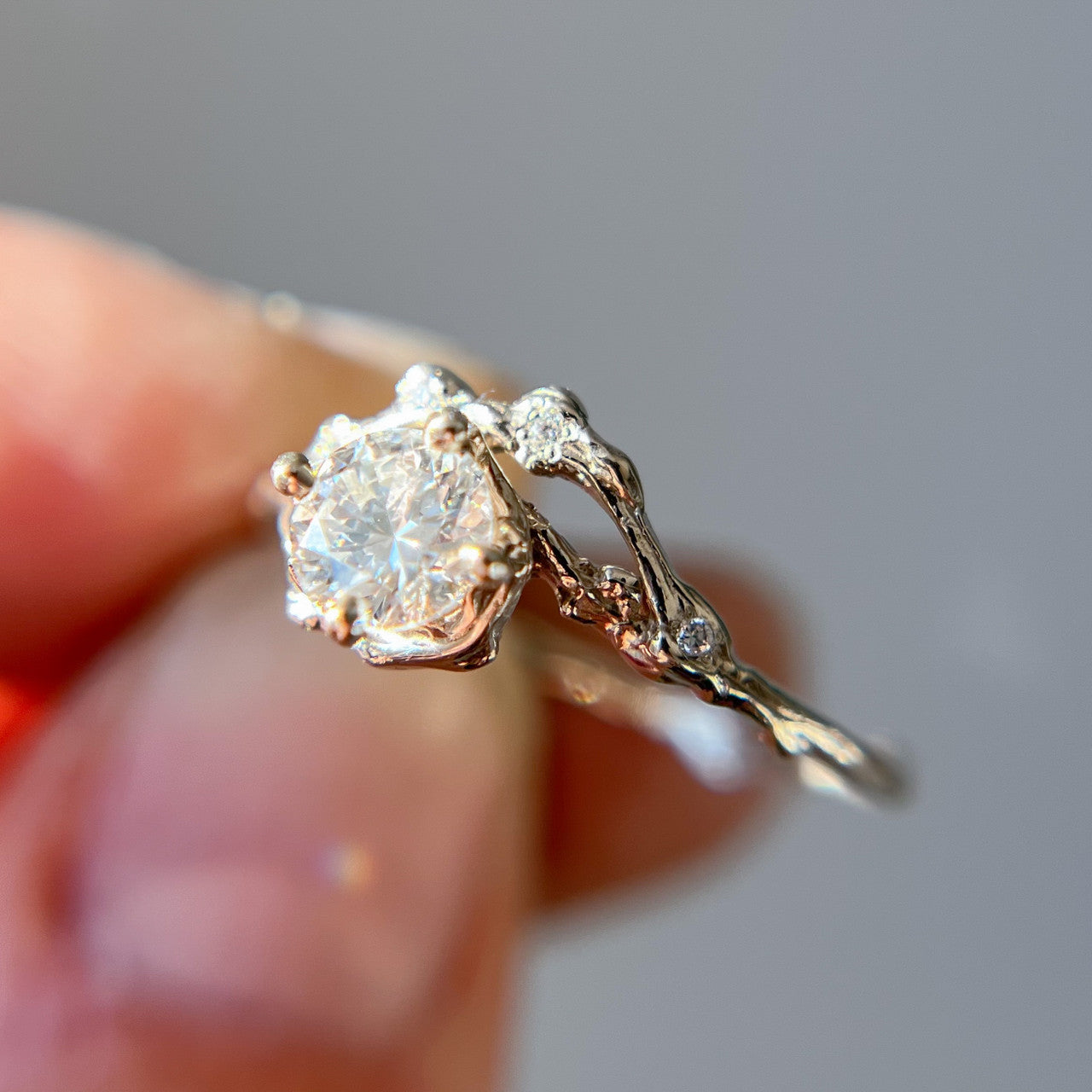 Demi Naples Moissanite Half Halo Ring