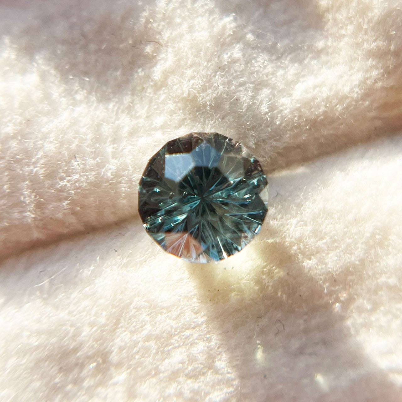 Parti Color Teal Sapphire StarBrite™ Cut by John Dyer