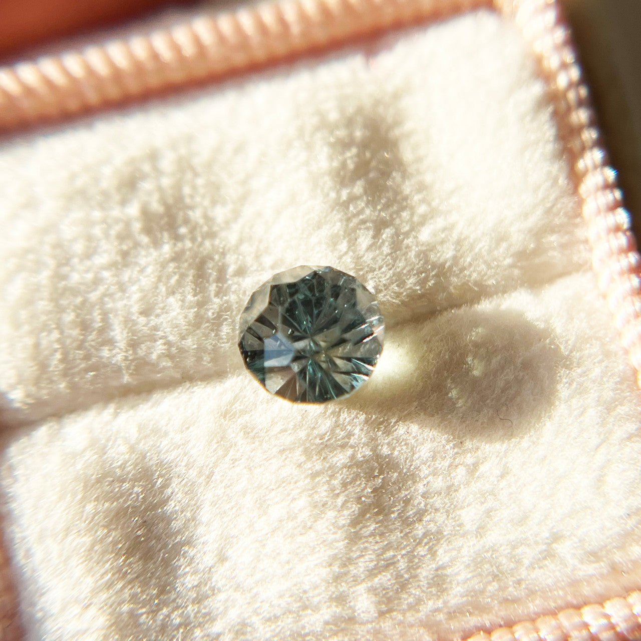 Parti Color Teal Sapphire StarBrite™ Cut by John Dyer