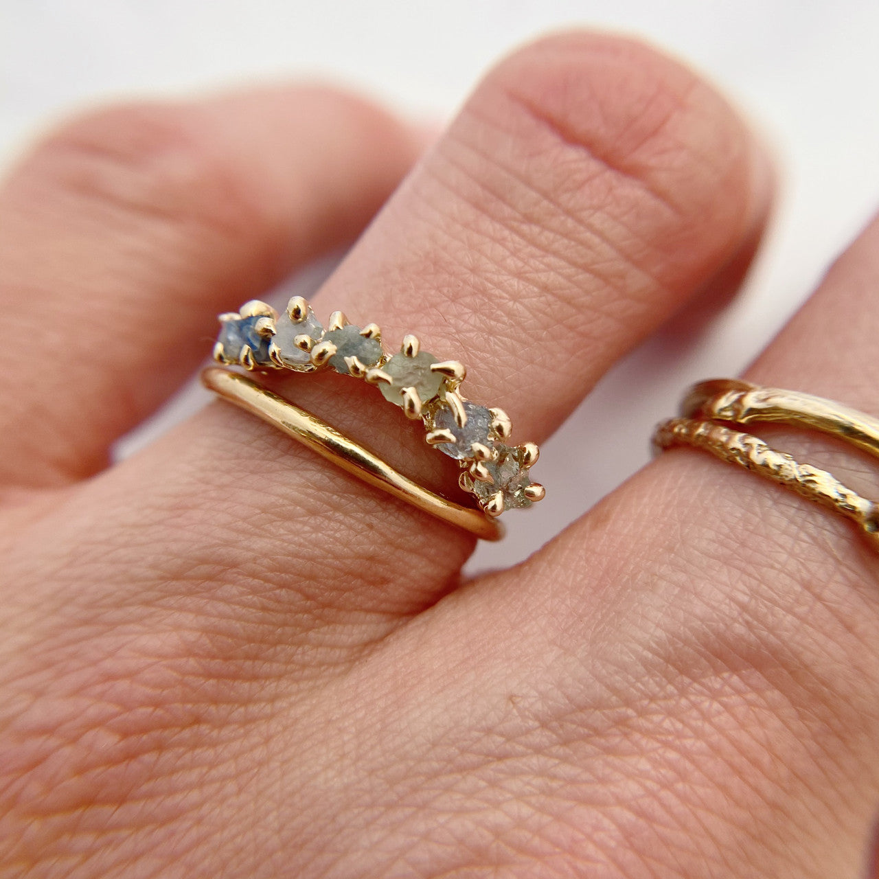 Montana Sapphire Garland Ring with 14K yellow gold band by Olivia Ewing Jewelry