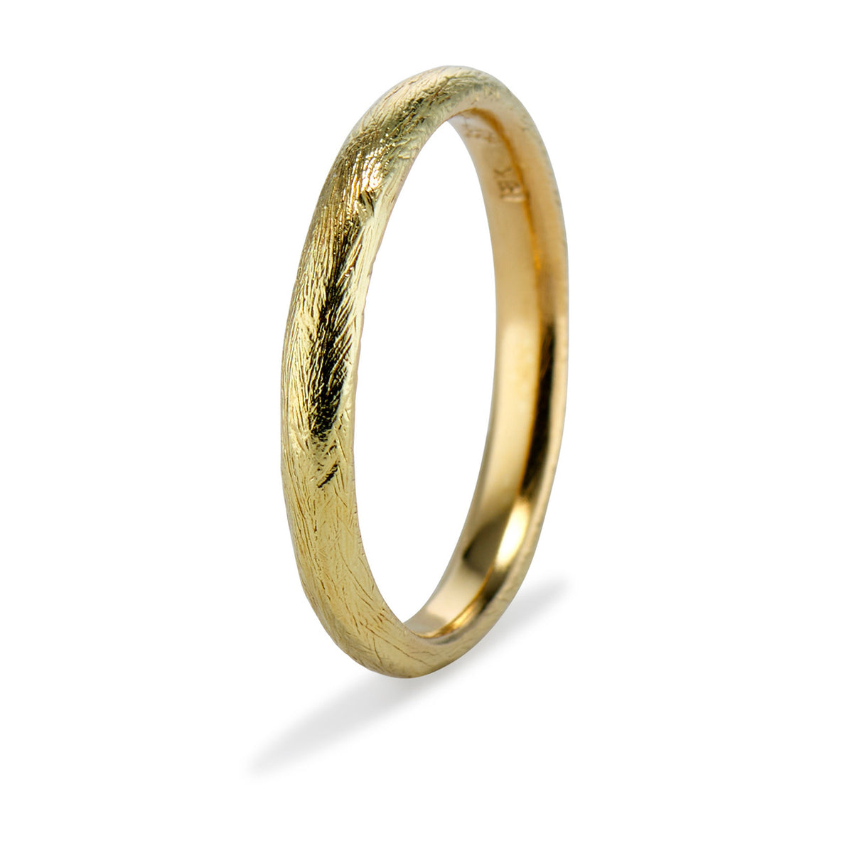 Textured gold wedding band by Olivia Ewing Jewelry