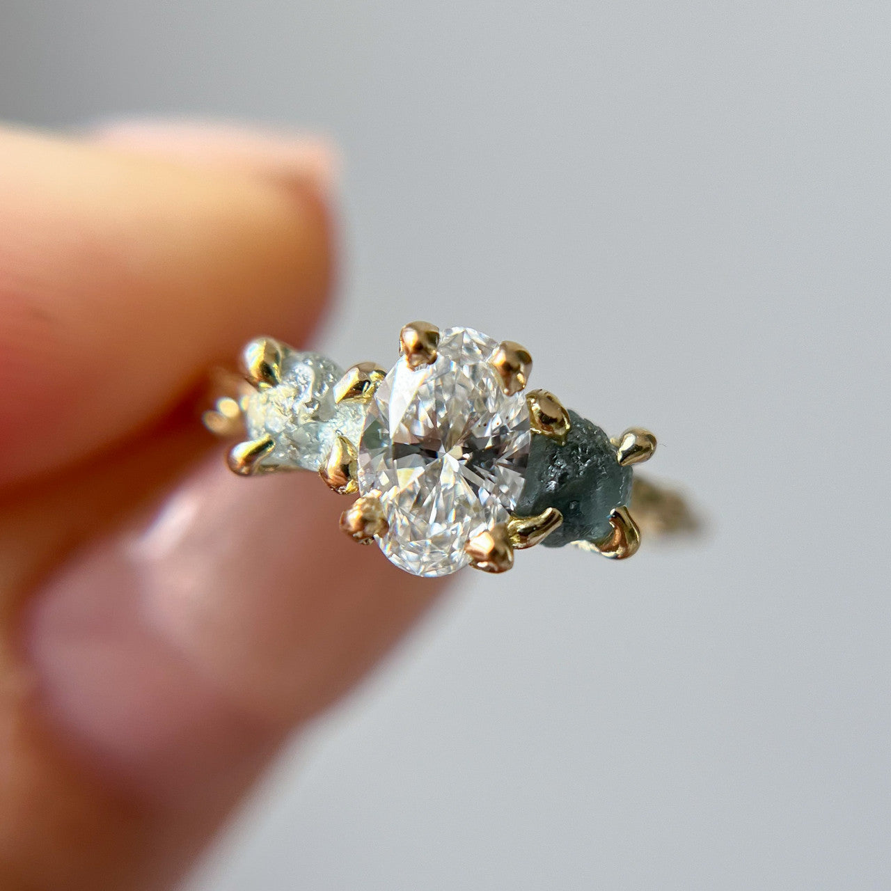 Naples Oval Diamond and Montana Sapphire Three Stone Ring