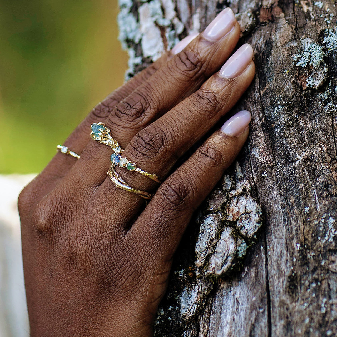 Rough cut nature engagement ring with montana sapphire by Olivia Ewing Jewelry